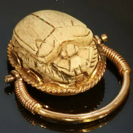 Typical Egyptian scarab ring with cartouched scarab set in gold swivel ring (image 10 of 15)